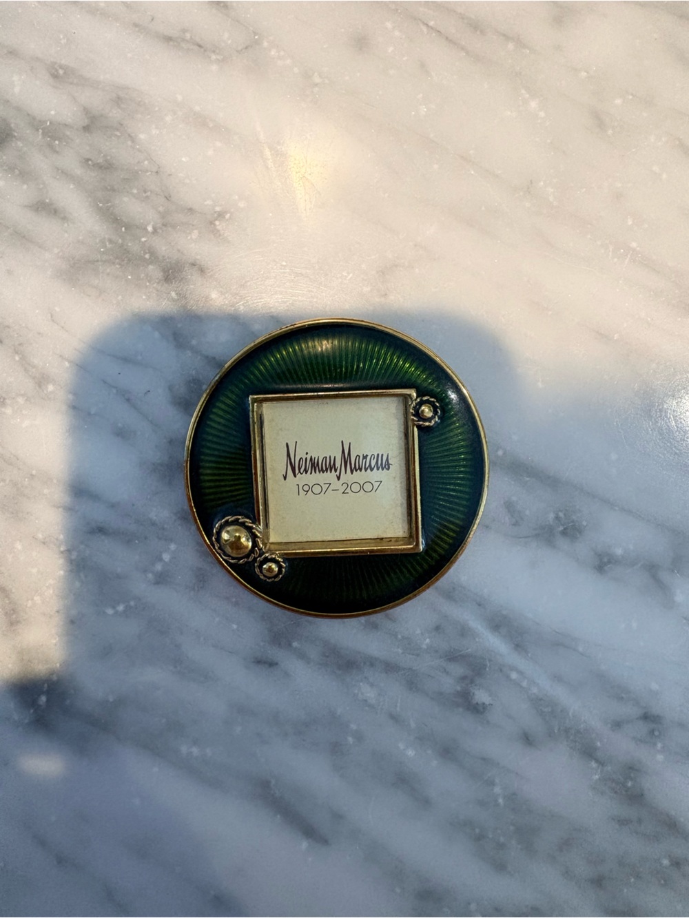 Neiman Marcus Gold and Emerald Round Enamel Pin
